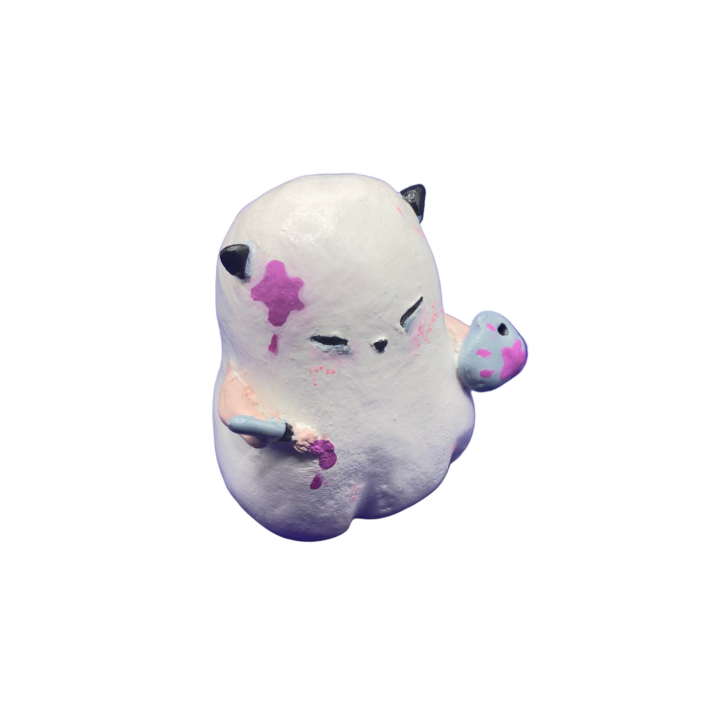 toy resembling a ghost with a pink flower on a white background